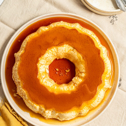 Bundt shape crème caramel on a plate.