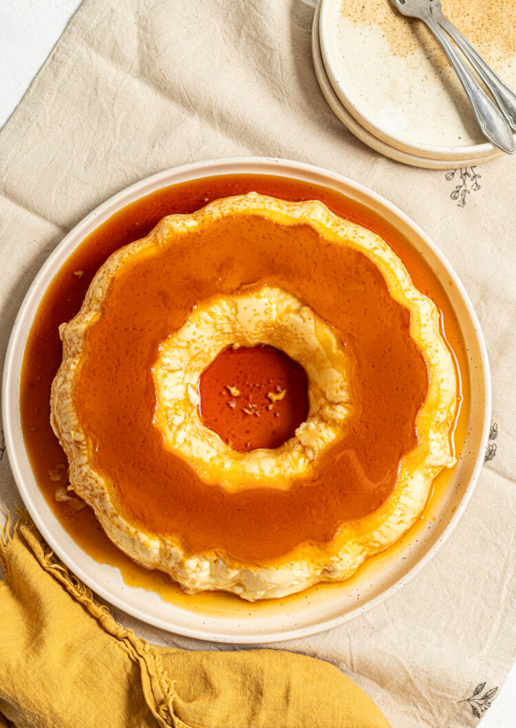Bundt shape crème caramel on a plate.