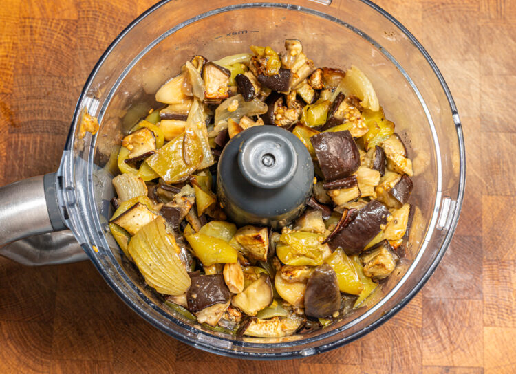 Roasted veggies in a food processor.