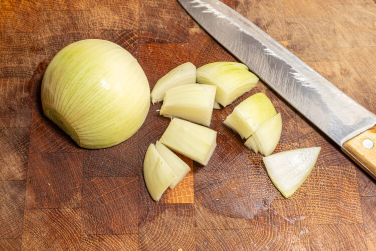 Chopping onion.