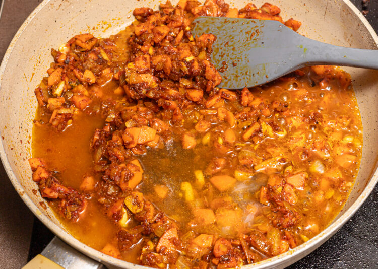 Stirring the base for a curry sauce.